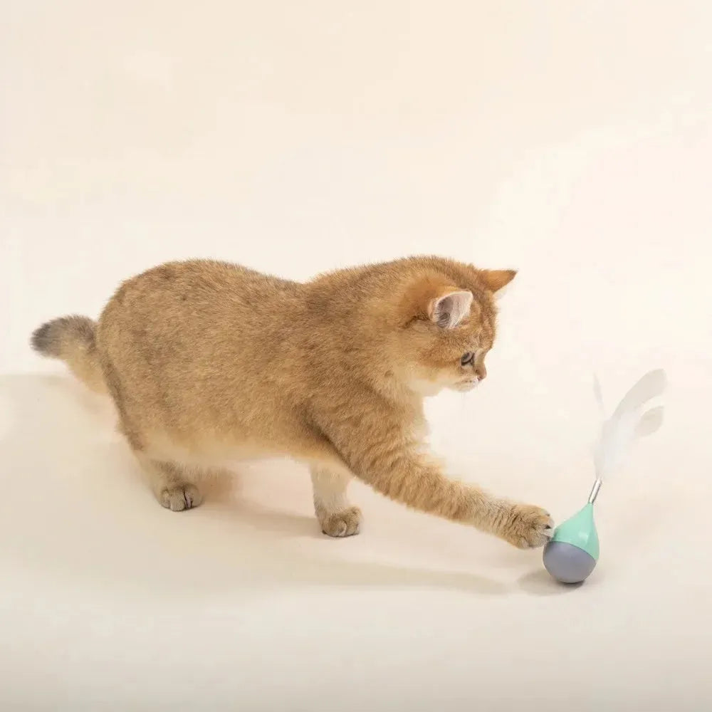 Green feather tumbler cat toy with attached tease stick and aluminium alloy components