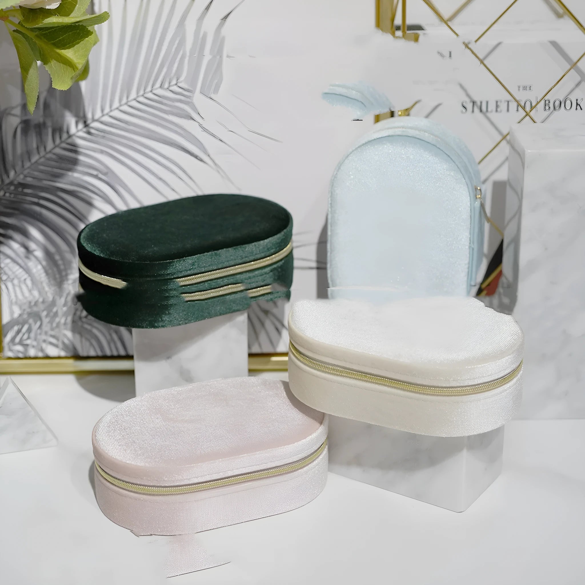 Oval velvet jewellery storage box with flannel interior in multiple colour options showing 15x10x5cm dimensions
