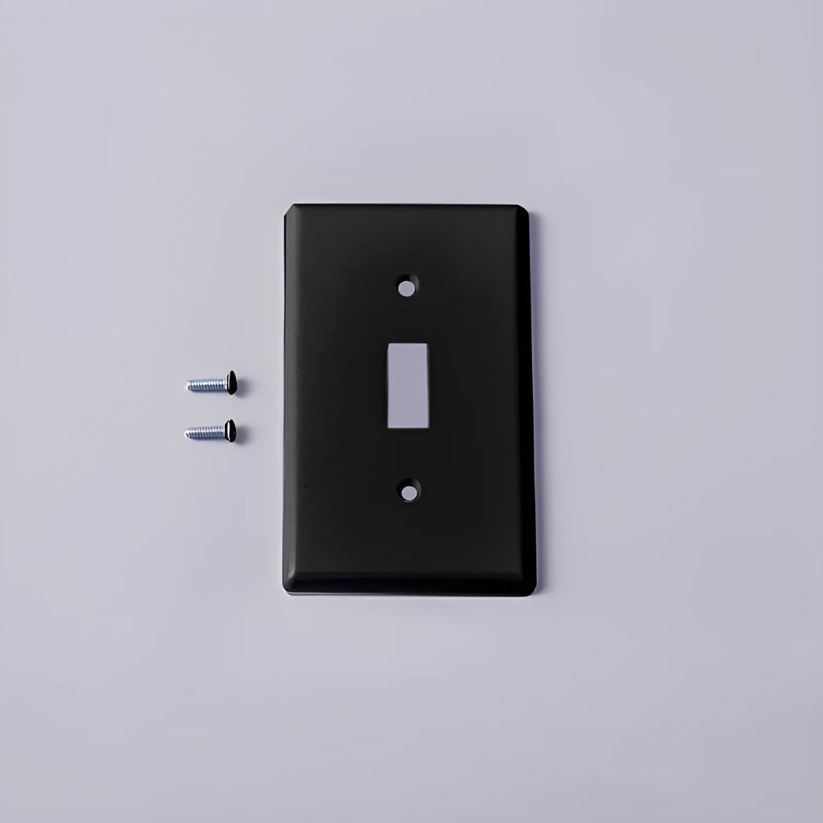 Black plastic wall-mounted socket panel for American standard outlets with surface shell design