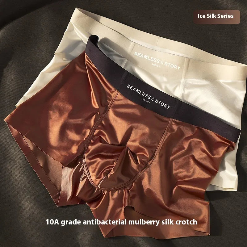Men's satin underwear in Ice Silk fabric on a mid-waist mannequin, showing coffee, light grey and blue colour options.