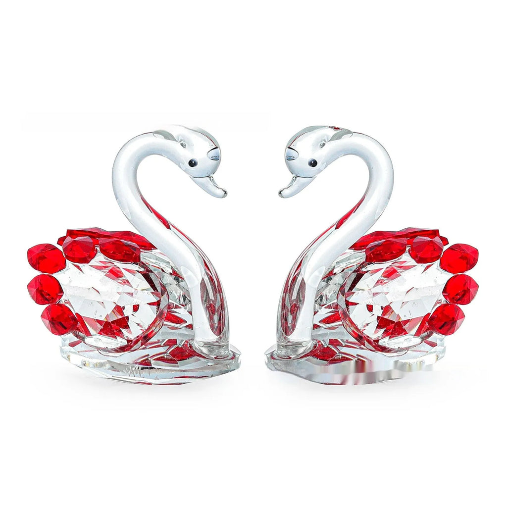 White crystal swan desktop decoration in red, blue, pink, or purple on a countertop