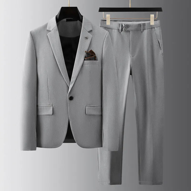 Men's slim fit three-piece suit set in dark gray viscose polyester, showing jacket, waistcoat and trousers