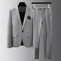 Men's slim fit three-piece suit set in dark gray viscose polyester, showing jacket, waistcoat and trousers
