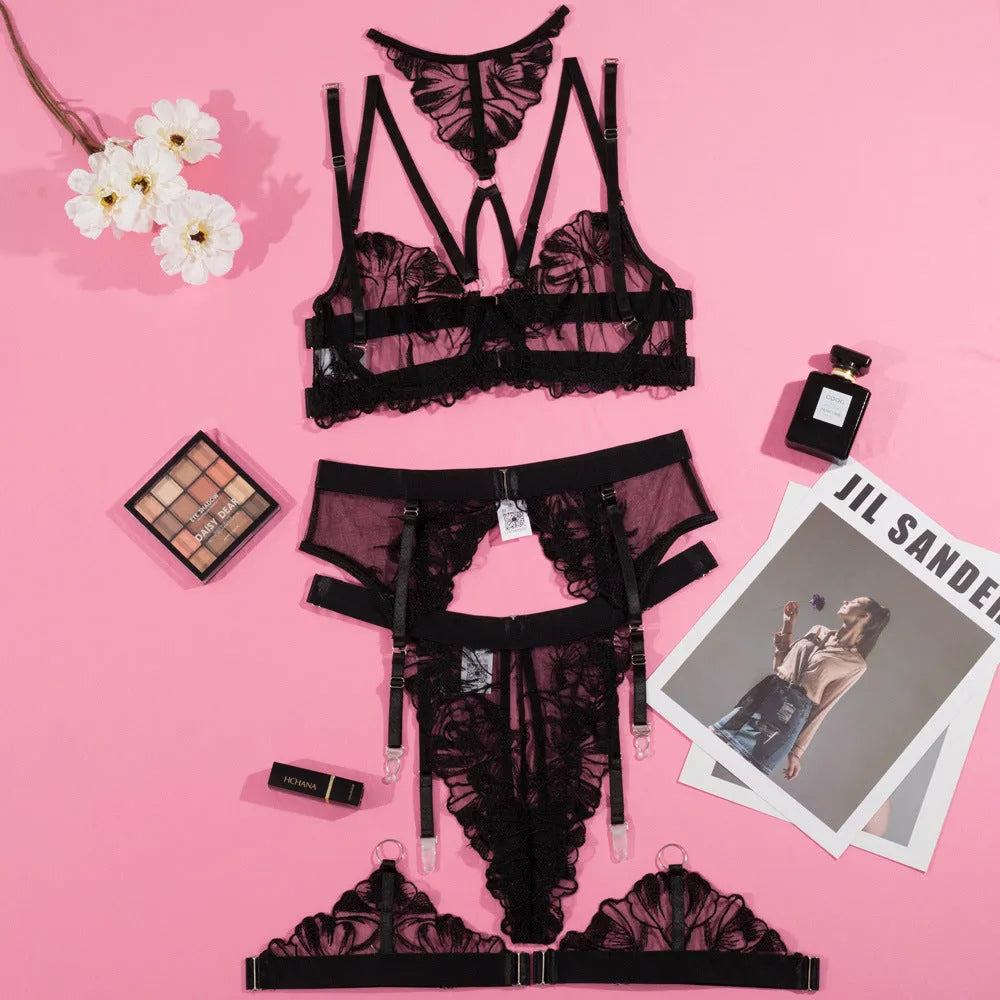 Black women's embroidered mesh bra bikini set showing three-point style