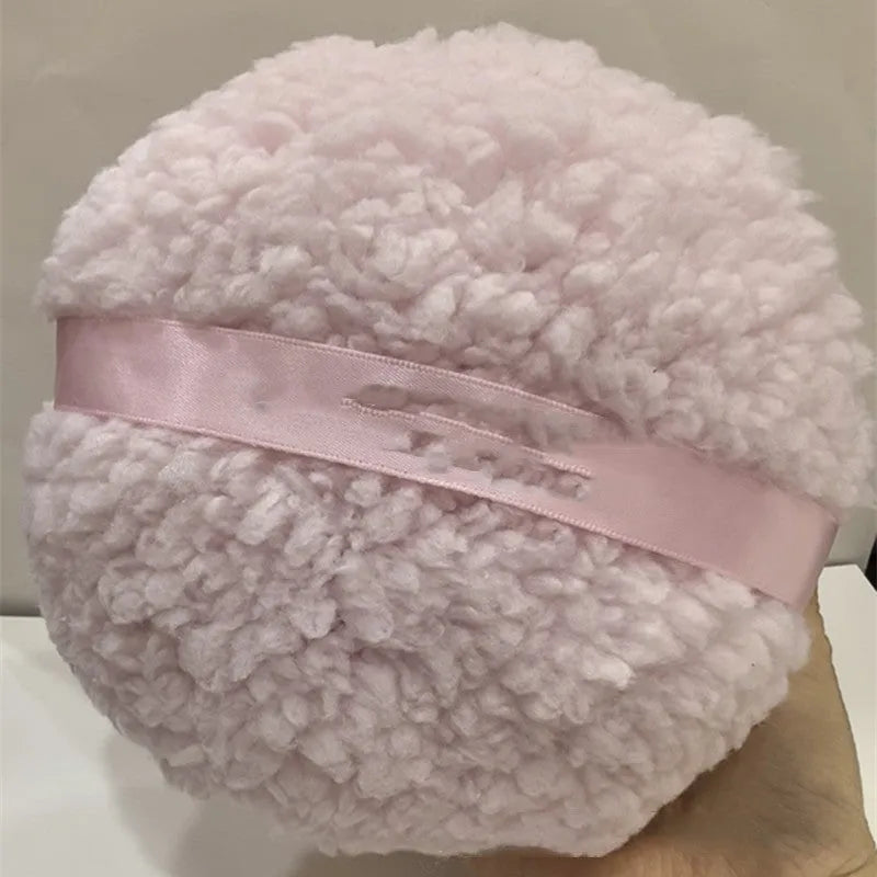 Oversized plush powder puff measuring 150x75mm in pink, skin colour or white
