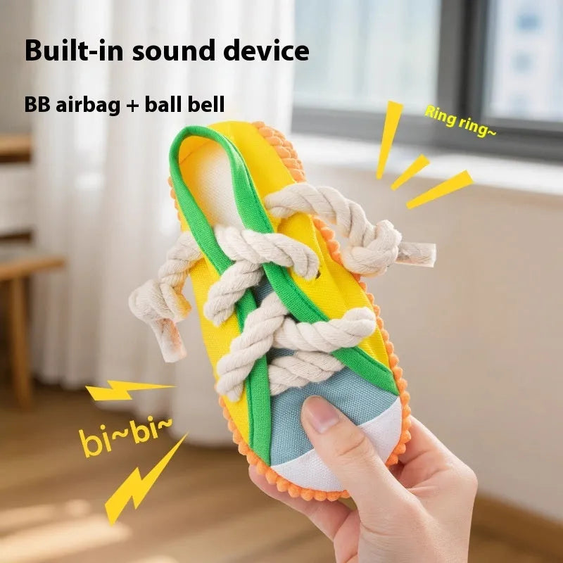 Plastic dog slippers toy in rock yellow, black, and sea fog blue colours with sound feature.