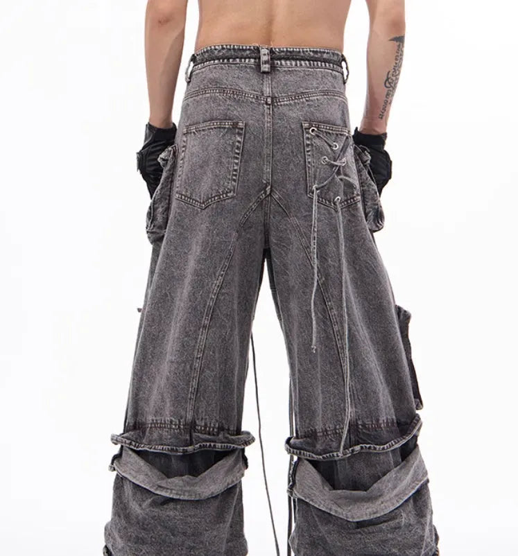 Grey distressed cotton denim mop pants with rope stitching, shown in a relaxed fit.
