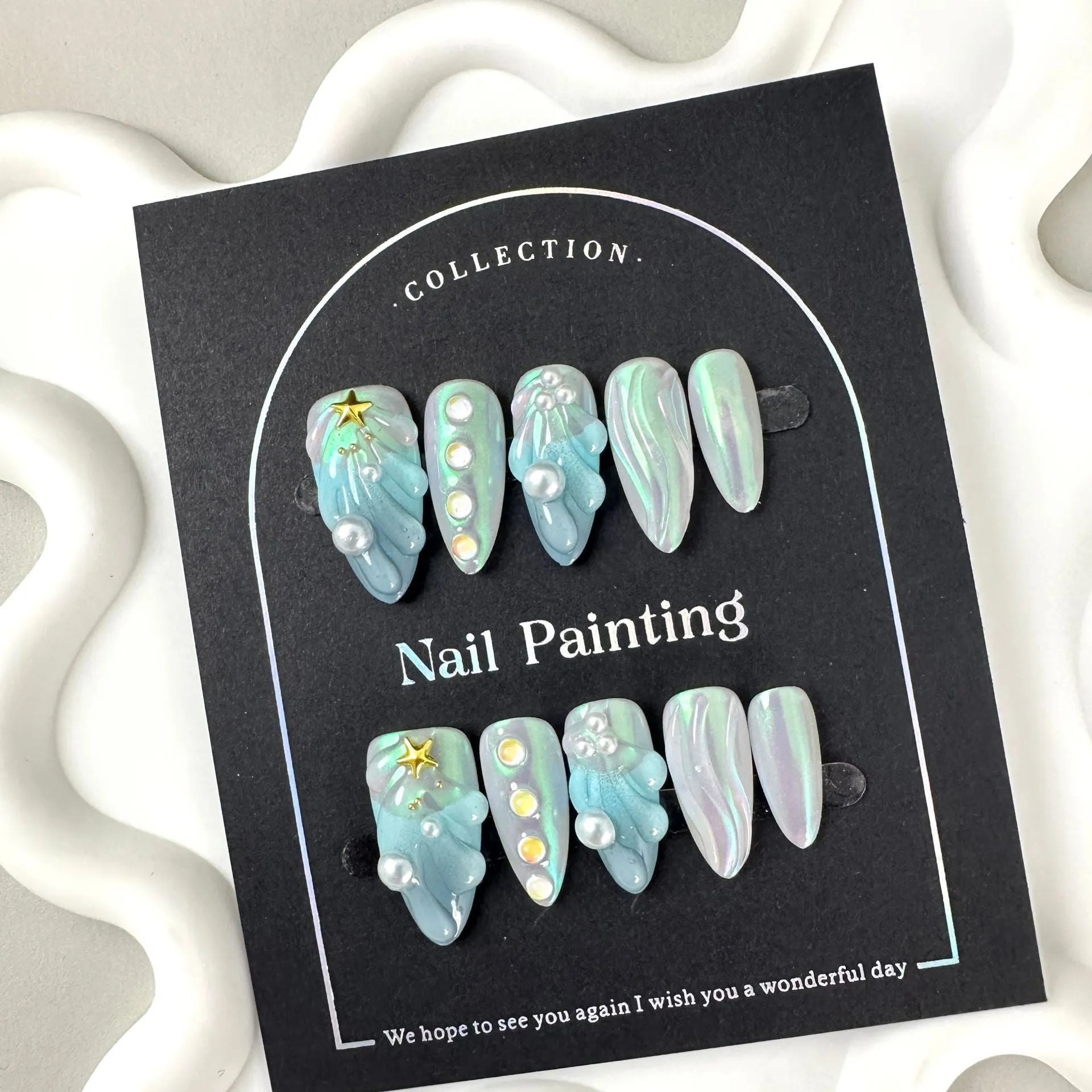 HAILANG blue plastic artificial nail tips set showing sizes XS, S, M, L for French manicure.