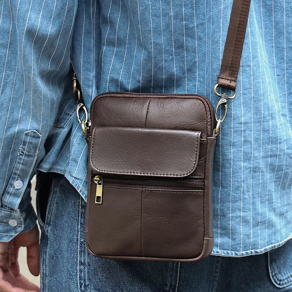 Men's brown leather crossbody shoulder bag with visible sewing detail