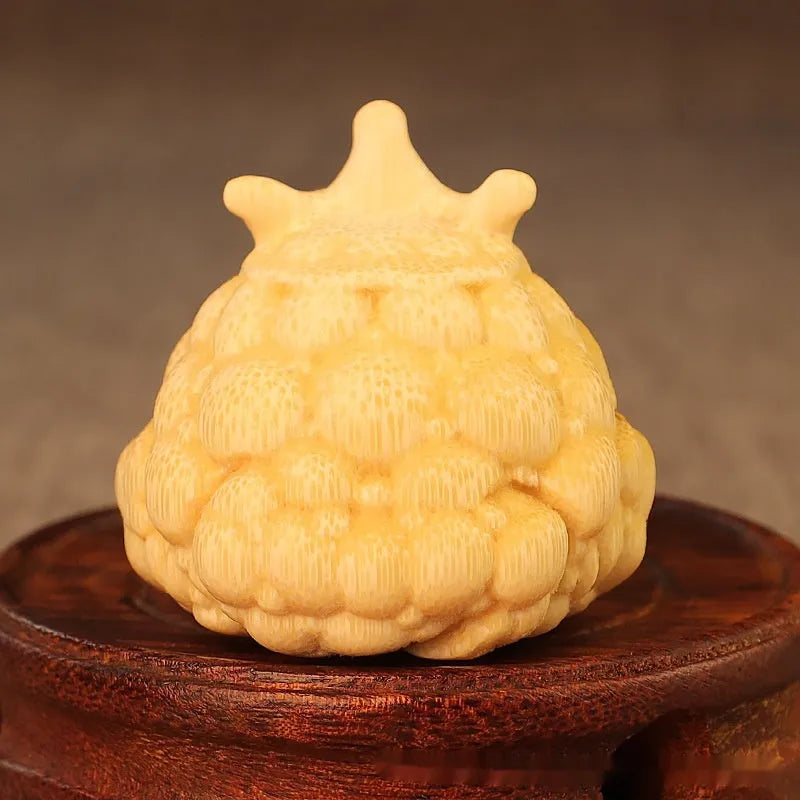 Hand-carved bamboo ornament of a cute Crown Princess toad with live eye detail