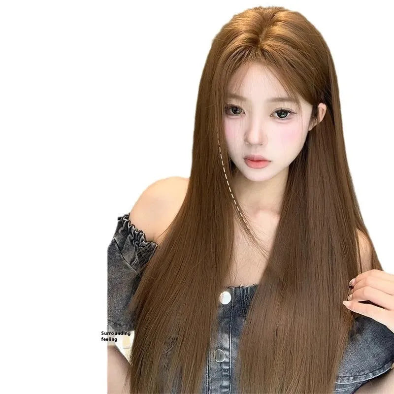 Warm brown lace front wig with centre-parted bangs and long straight synthetic hair