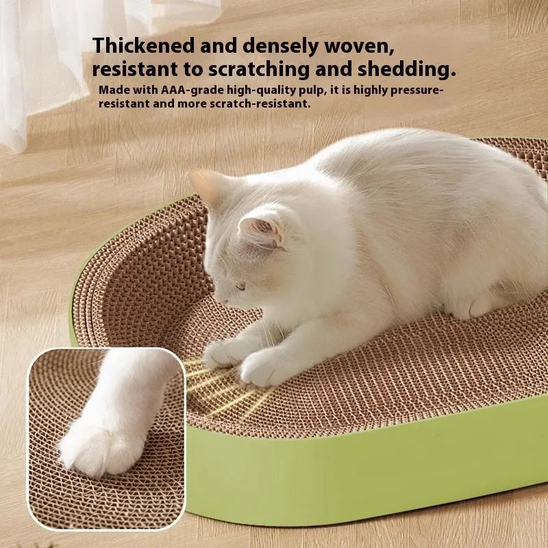 Green oval corrugated paper cat scratch board and nest measuring 55cm in diameter