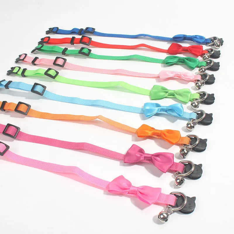 Adjustable nylon cat collar with bell in striped pattern showing multiple colour options