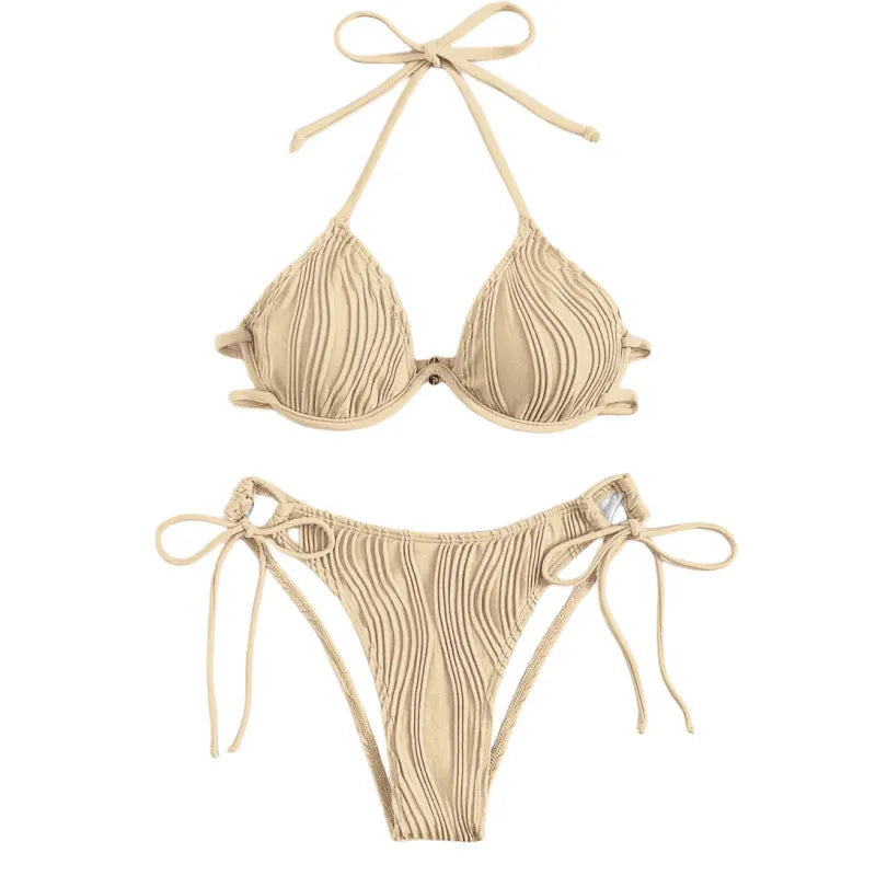 Women's apricot coloured split bikini swimsuit with steel bracket underwire on a mannequin.