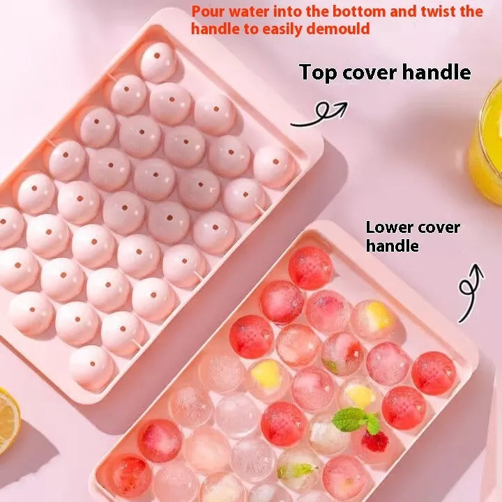 Blue silicone ice cube tray with lid showing 33 round compartments for making ice balls