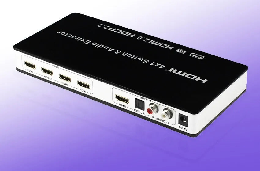 Black 4-port HDMI input switch with remote control on a table