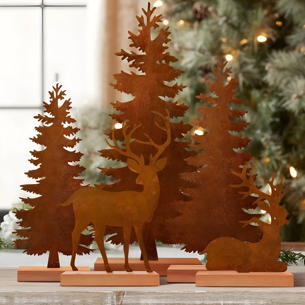 Set of three rustic metal Christmas tree elk ornaments with distressed iron finish.