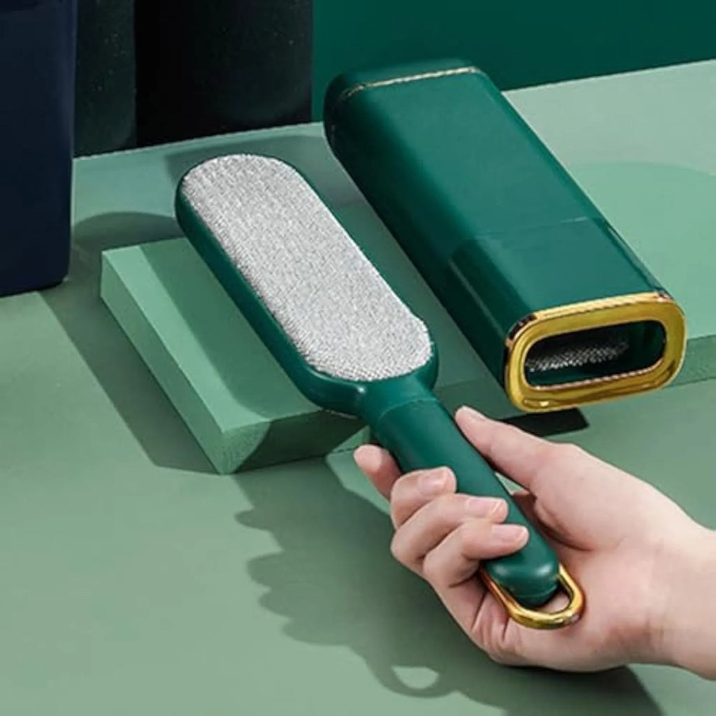 Blue reusable pet hair remover brush with a self-cleaning storage base.