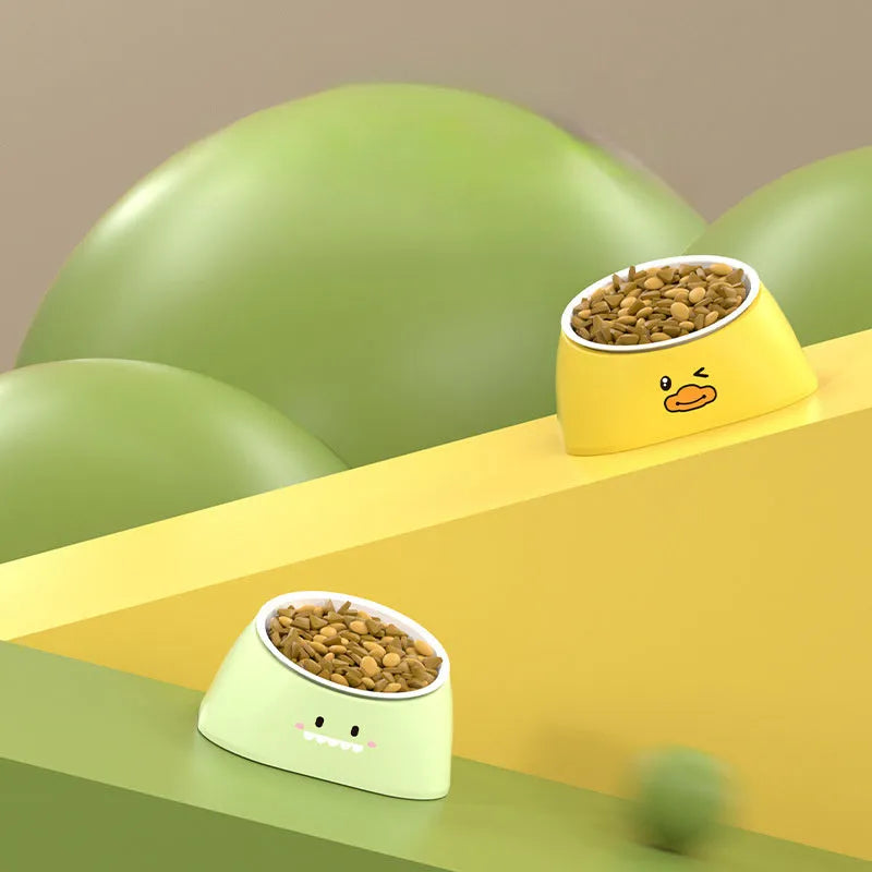 Green tilted stainless steel pet bowl showing 15-degree feeding angle
