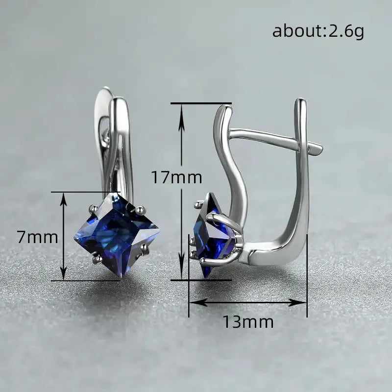 Copper earrings with diamond design and blue zircon inlay for women.