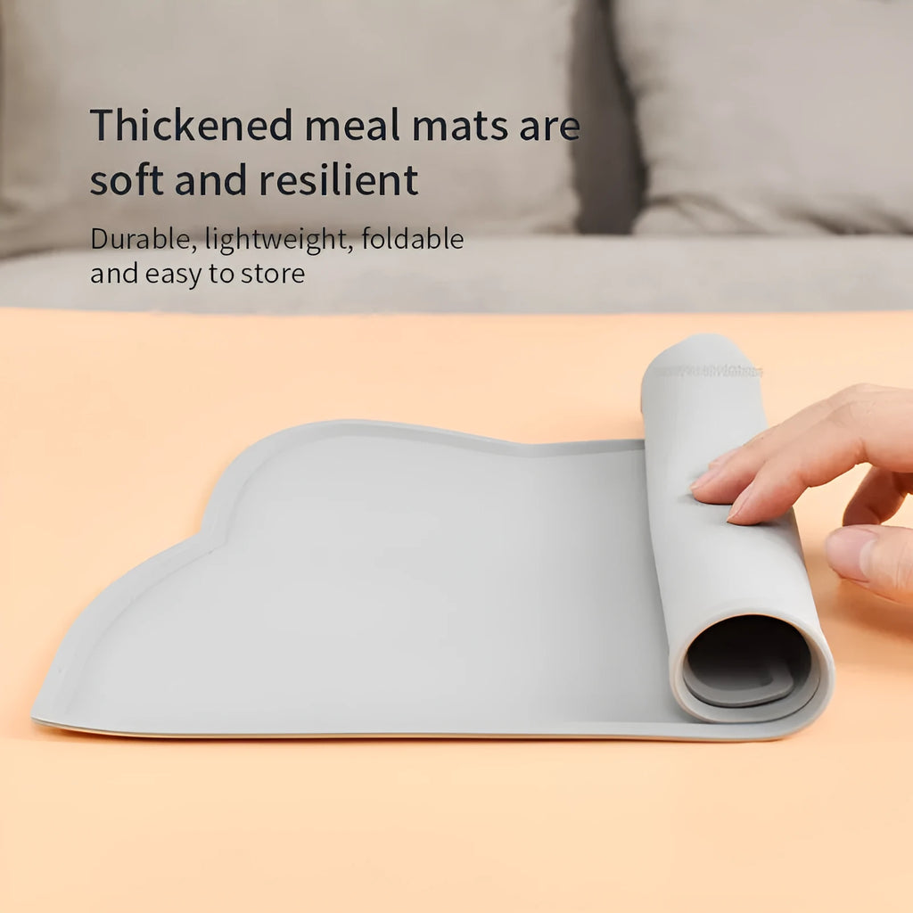 Cat head shaped silicone pet feeding mat in solid colour measuring 44 by 24 centimetres