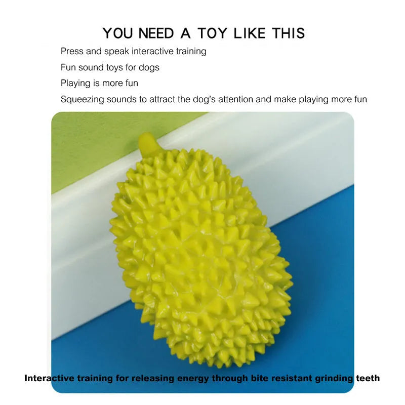 Durian-shaped milk-flavoured dog chew toy in beige with raised bumps for teeth cleaning and a bonus ball
