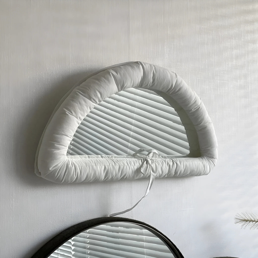 Hanging fabric mirror panel with cotton filling in white, black, or sapphire blue colours