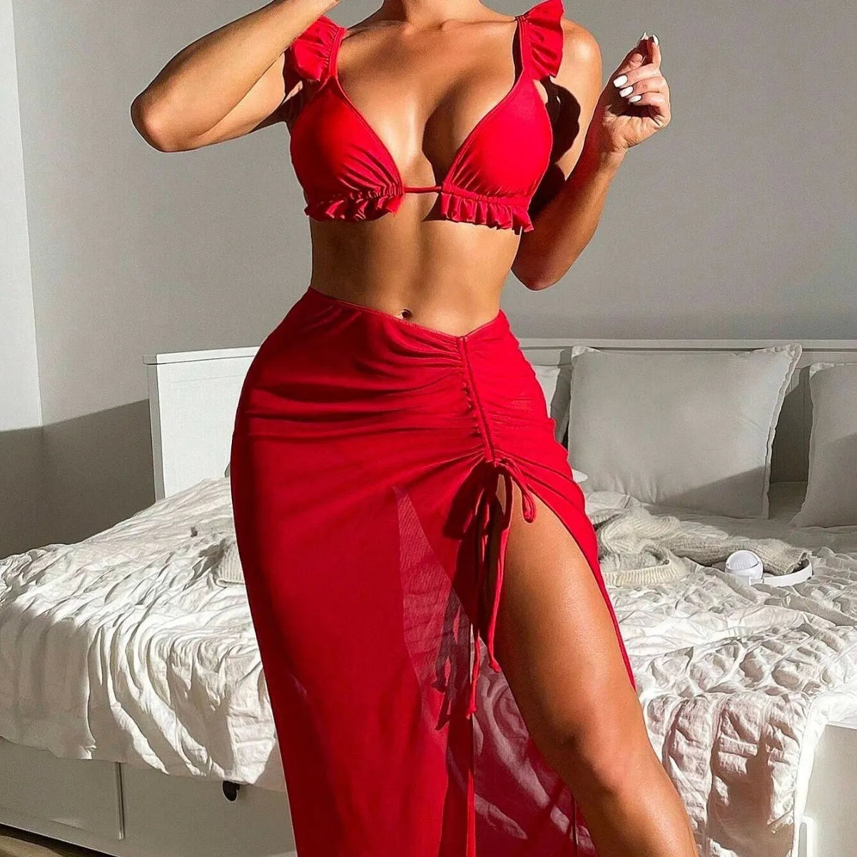 Women's printed split style bikini three-piece set with a skirt, shown in one of six available colours.