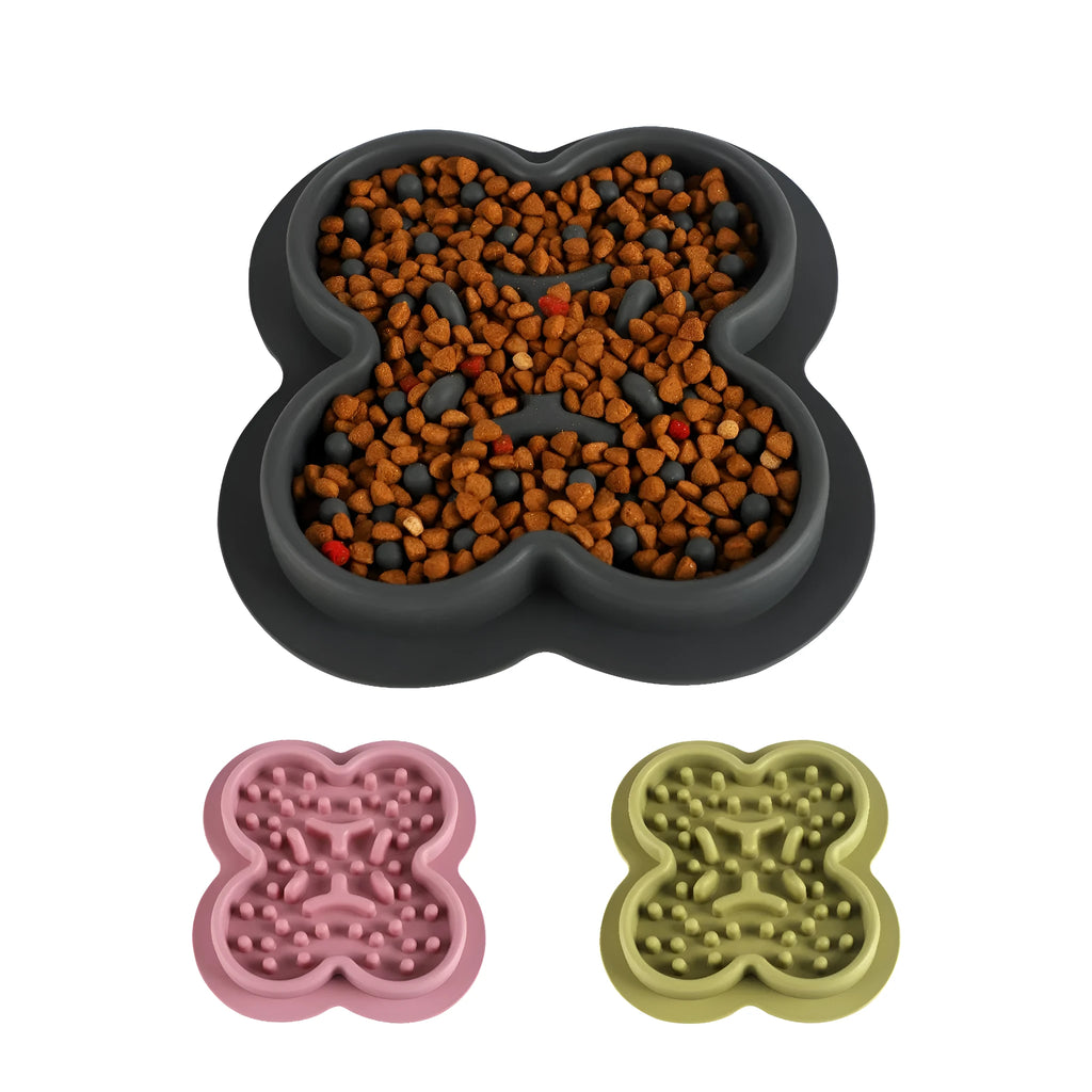 Silicone pet licking pad slow feeder mat in various colours on wooden floor