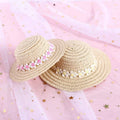 Handmade adjustable bowknot paper hat for a dog or cat, shown in a cartoon style.