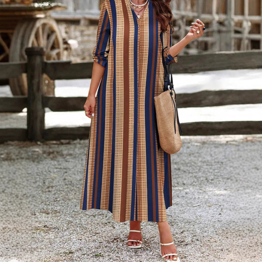 Camel coloured vertical striped V-neck long dress with A-line skirt silhouette