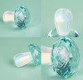 Small crystal mushroom decoration in modern geometric design, 40mm by 53mm.