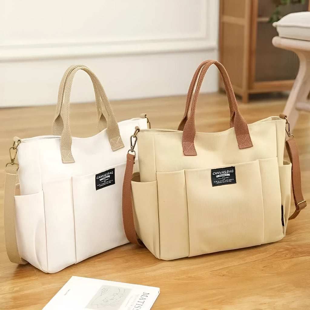 Canvas shoulder bag in khaki, 31cm wide, with handle and crossbody strap, urban simplicity style