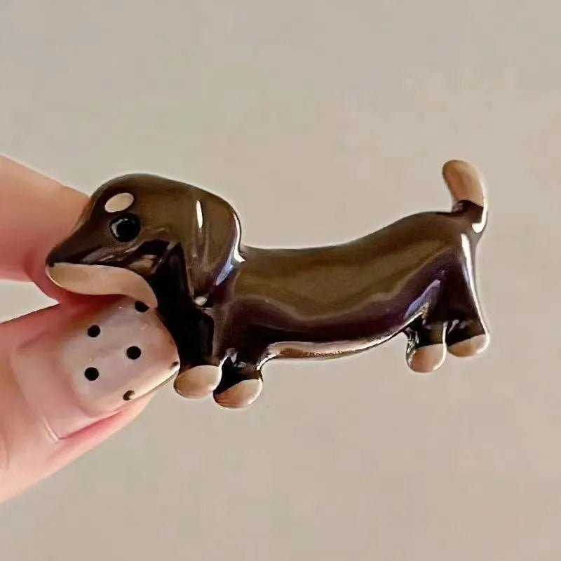 Dachshund dog design hair barrettes with electroplated finish, showing front and back views