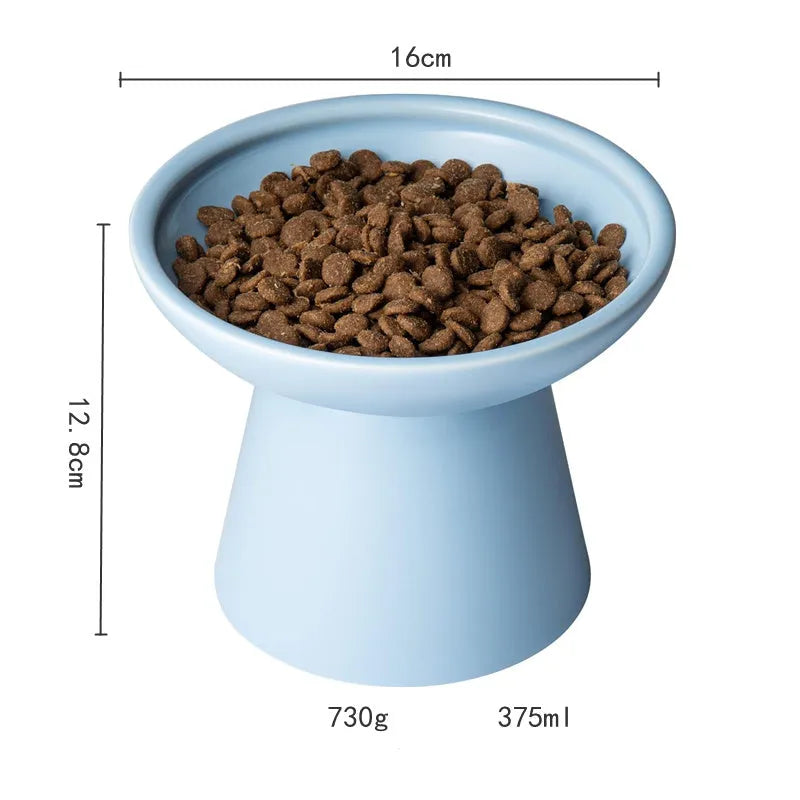 Blue ceramic elevated cat food bowl with wide shallow dish for whisker fatigue prevention.