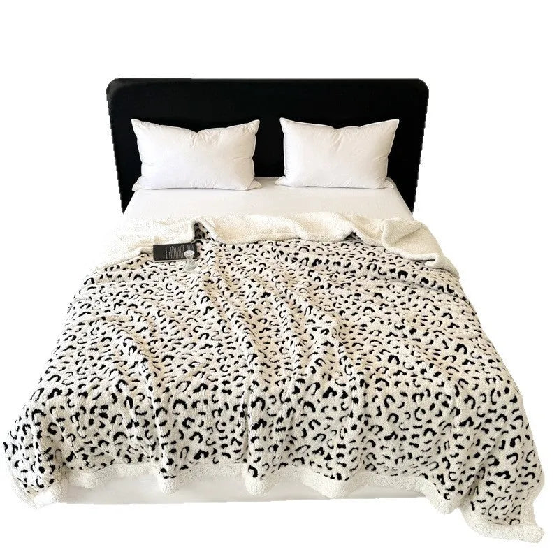 Double-layer cationic leopard jacquard taffeta blanket in animal print pattern showing texture and size options