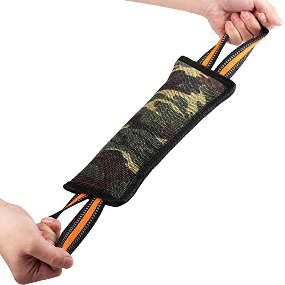 Reflective dog training jute bite stick with yellow edge, 55 cm length, on outdoor grass