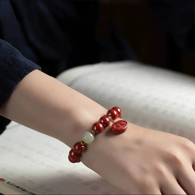 Natural cinnabar Emperor sandstone Ping An Fu Lu bracelet with 8mm and 10mm size options.