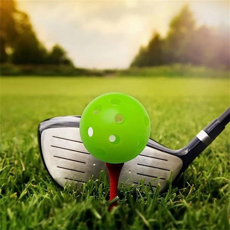 Multi-colour golf practice balls in red, orange, blue, green, white and yellow with net pocket