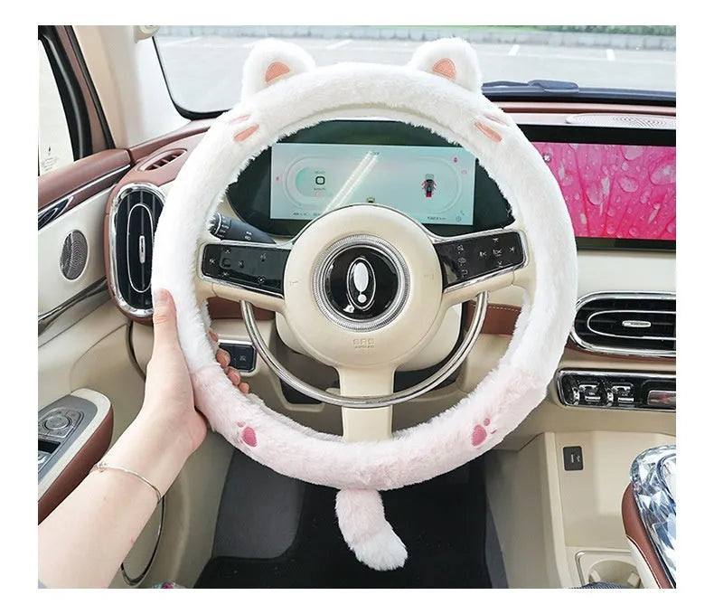 Plush steering wheel cover with embroidered animal design measuring 38cm in diameter