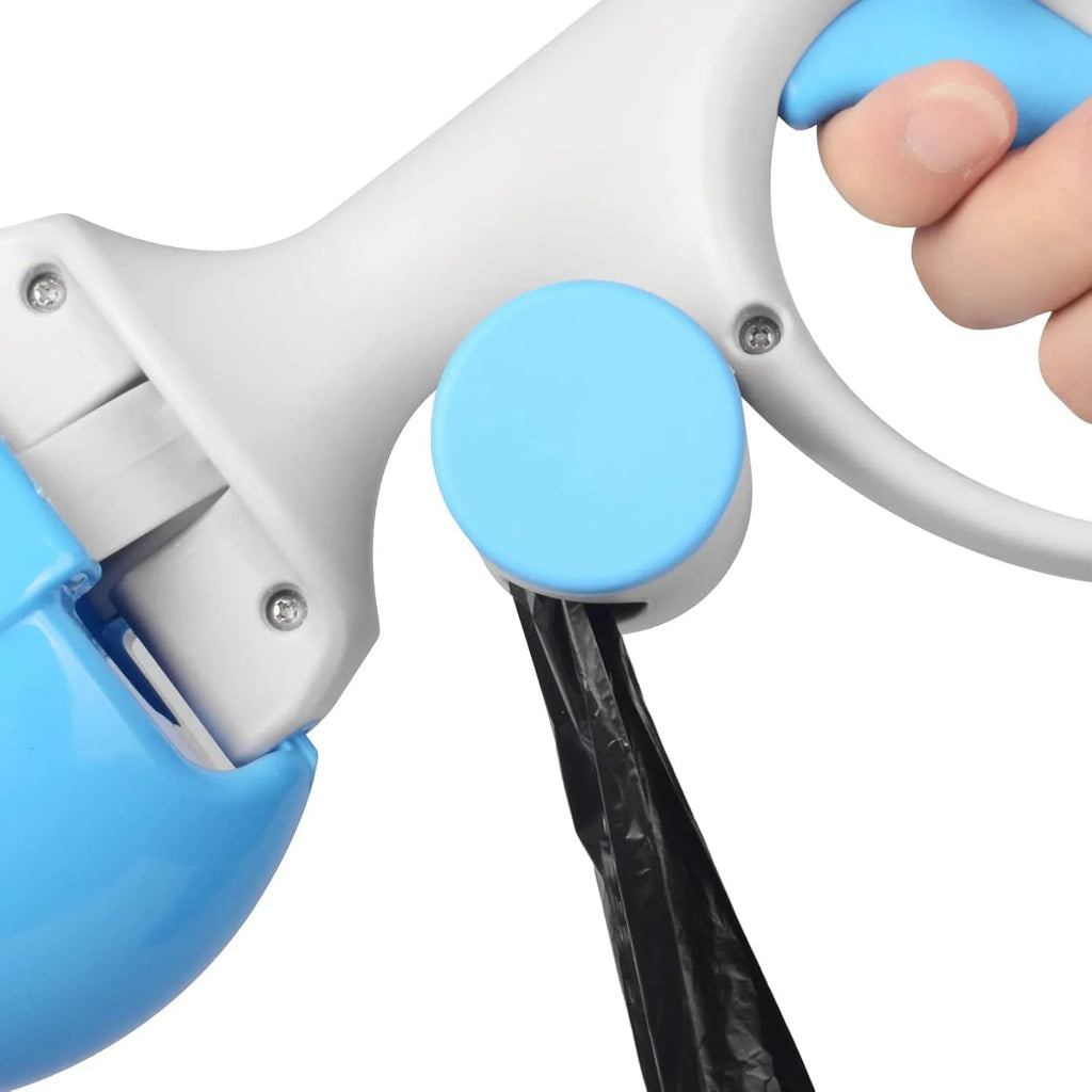 Blue pet pooper scooper with built-in trash bag holder and a hanging hook on a green lawn